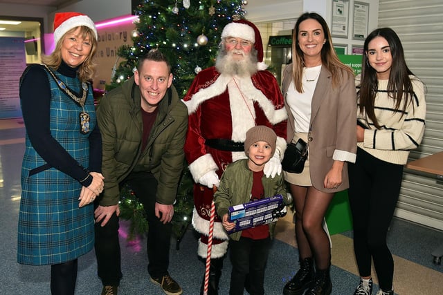 Lord Mayor of ABC Council, Alderman Margaret Tinsley and Santa pictured with the Greene family during a visit to Craigavon Area Hospital on Christmas Eve.