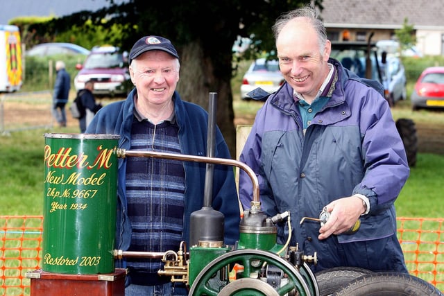 ALL SMILES...Ray Hume and PJ McGuinness pictured during the Garvagh Clydesdale and Vintage Show in 2008