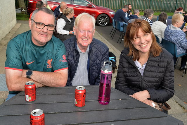 Pictured at the Shankill Parish summer barbequeon Wednesday evening are from left, Paul Richardson, Alan Cordner and Carole Kane. LM27-237.