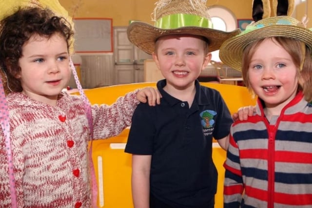 Alesha Carroll, Luke Henderson and Auryn O'Neill at the Mulberry Bush Playgroup Easter party in 2014.