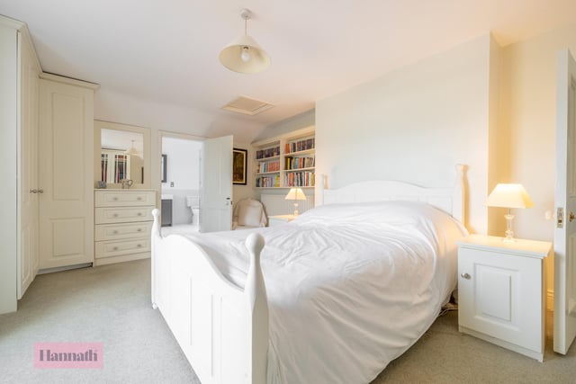 The master bedroom has a rrear aspect overlooking walled courtyard and surrounding countryside. There is an extensive range of fitted robes, chest of drawers and book shelving and has access to a spacious four-piece en suite bathroom.