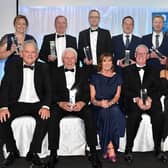 Prizewinners at the Mid-Ulster Business Awards which were held in the Royal Hotel, Cookstown in 2023.  Also included are, compere, Adrian Logan, front left, and Julie McKeown, front centre, of main sponsors, Henry Brothers. Picture: Tony Hendron