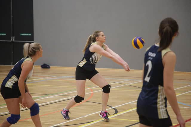 Catherine Murphy digs the ball for UUC 1