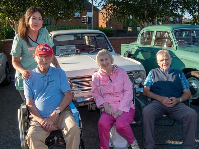 Enjoying the vintage rally at Mahon Hall Care Home are from left, Ciara McGahan, care assistant; William Bullick, resident, and Maud and John Greer, owners of a 1965 Vauxhall Viva.