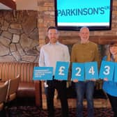 Mike McKee and Kenneth McConaghy with Emma McNeill from Parkinson’s UK