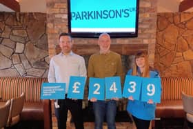 Mike McKee and Kenneth McConaghy with Emma McNeill from Parkinson’s UK