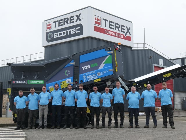 Some of the local team at Terex Campsie who brought the blue machine to life. CREDIT TEREX