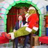 The Grinch has perched himself on Rushmere Shopping Centre manager, Mr Martin Walsh's knee - and just outside the new Grotto which is being officially opened on Thursday at the Christmas Lights Switch on. Lots happening between 4-9pm.