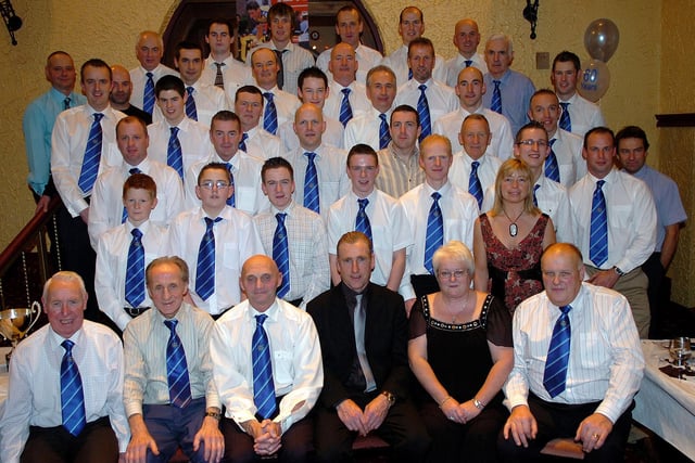 Former world champion cyclist Sean Kelly with the committee of the RT Autoparts East Tyrone CC who celebrated the club's 60th anniversary in 2007.
