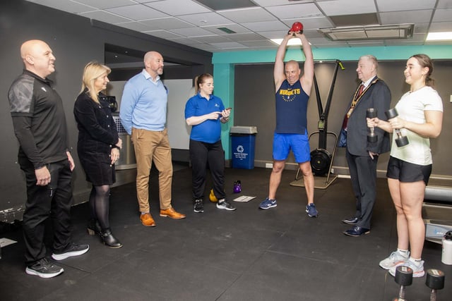 Mayor of Causeway Coast and Glens, Councillor Steven Callaghan, is shown some of the new equipment in the HIIT Room by fitness instructors Annie Docherty and Simon Pimblet.