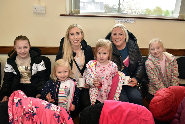 Taking time out for a photo at the Loughgall Playgroup coffee morning are from left, Lexie Anderson (10), Pippa Reid (3), Mandy Reid, Alice Reid (6), Ellie Anderson and Annabelle Reid (10). PT16-212.