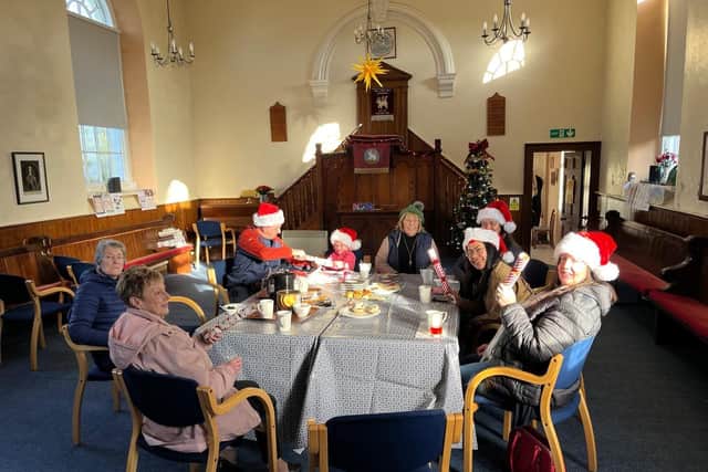 Volunteers attending a community coffee morning at Ballinderry Moravian Church. The group has been awarded an £18,000 grant from The National Lottery Community Fund to make their building more accessible and run activities for local people.