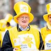 Join volunteer collectors Sam Dickson (left) and Edwina Tester (right) this March to give two hours of your time to collect money to help Marie Curie care for terminally ill people.