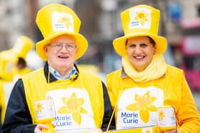 Join volunteer collectors Sam Dickson (left) and Edwina Tester (right) this March to give two hours of your time to collect money to help Marie Curie care for terminally ill people.