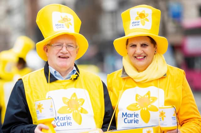 Join volunteer collectors Sam Dickson (left) and Edwina Tester (right) this March to give two hours of your time to collect money to help Marie Curie care for terminally ill people.