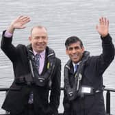 Prime Minister Rishi Sunak and Northern Ireland secretary Chris Heaton Harris during their visit to Belfast yesterday on the General Election campaign trail. Photo: Stefan Rousseau/PA Wire