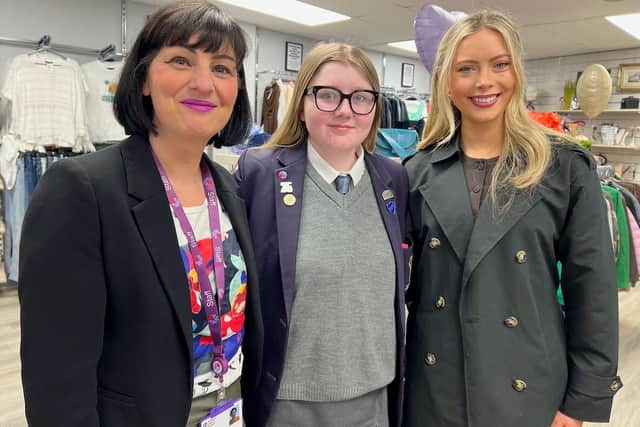 Fiona Gillespie, Manager of the new Carrickfergus Hospice shop; NI Children’s Hospice Youth Ambassador Madison Wright; and Miss Northern Ireland Hannah Johns.