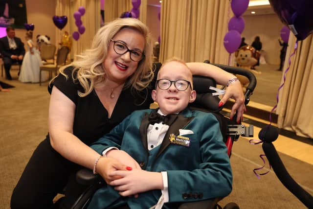 Blake McCaughey enjoying the 2023 WellChild Awards ceremony in London with his proud mum Christine. Picture: Antony Thompson/TWM