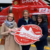 Ramona Vrancut, Emma Kean and Naomi McDonald at their recent visit to Air Ambulance NI’s operational base. Missing from photo are other team relay members Laura Carson and Nuala McAleer.