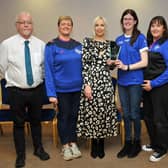 Deputy Lord Mayor, Councillor Sorcha McGeown congratulates Anne-Marie Henderson, Tracey McCavigan and Eileen McGivern from the Clan Na Gael Well Being Committee on winning the Ulster GAA Healthy Club Award. Included are Councillors Liam Mackle and Mary 'Dowd.