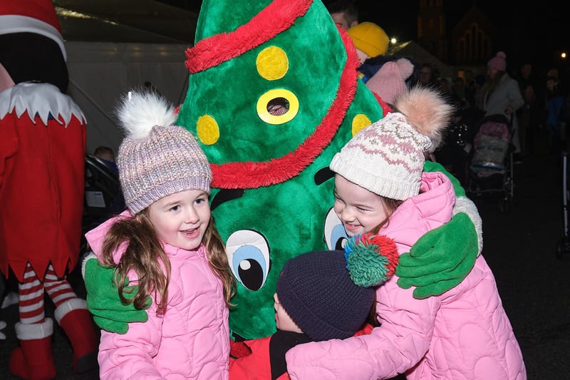 Getting a hug from one of the festive characters in Magherafelt on Saturday night.