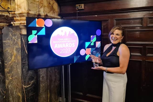 Julienné Elliott, Council’s Town and Village Manager, accepting the award for Best Accessibility Scheme at the Town and City Management Industry Awards 2023. Credit: Causeway Coast and Glens Borough Council