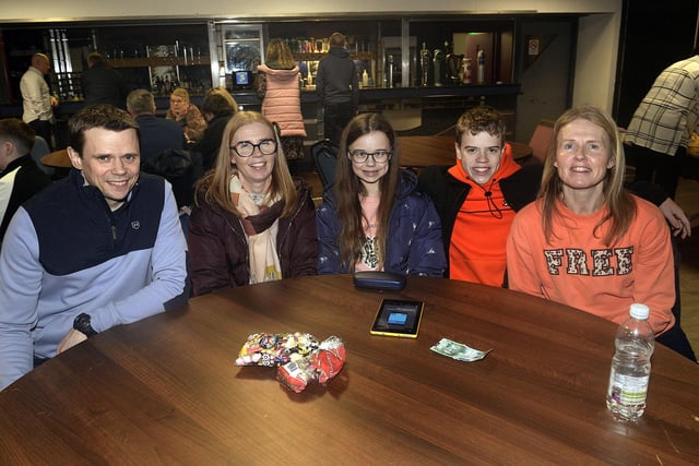 Enjoying the fun at the Friends Of Portadown College quiz are from left, Stuart Henderson, Sandra Coulter, Emily and Joshua Henderson and mum Karen. PT09-210.