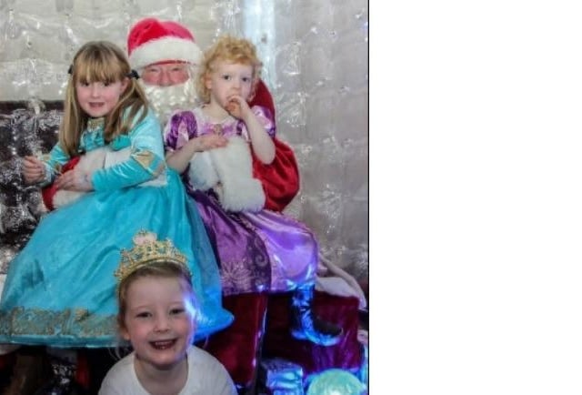 Amber, Leah and Tess with Santa at Ballyclare's 2014 Christmas switch on event.