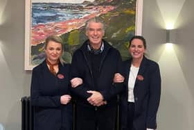 Actor Pierce Brosnan with staff from Ballycastle's Salthouse Hotel
