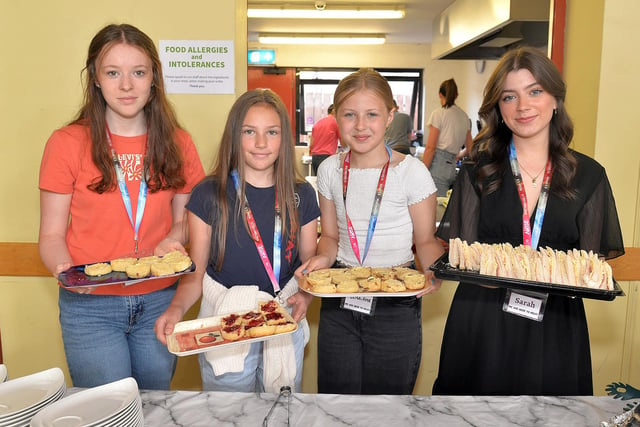 Making sure guests are well fed at the Thomas Street Methodist Youth Fellowship coffee morning are from left, Sophie Allen, Amber Henderson, Elissa-Rose Wilson and Sarah Cranston. PT26-206.