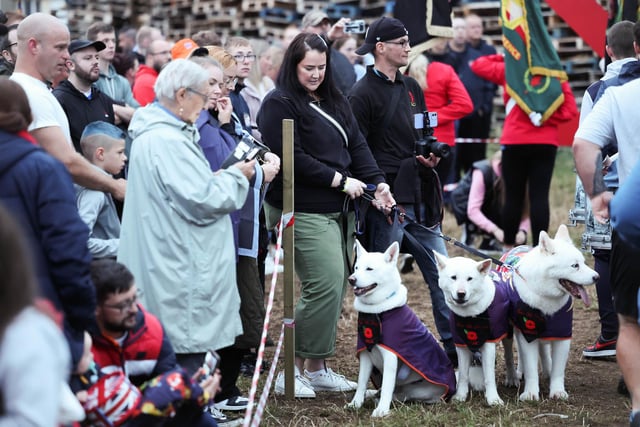 The Corcrain Redmanville bonfire night was dedicated to the late Sam Dickson who was a familiar figure at parades with his three 'marching Akitas'.