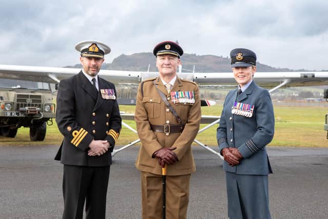 At the launch of Armed Forces Day 2025 are Cdr Thomas Wardley RN (Senior Naval Officer NI); Lt Col Kevin Thomas (SO1 Engagement | Headquarters 38 (Irish) Brigade & Joint Military Command (NI)); Wg Cdr Jacqueline Rankin (SO1 Engagement, Media & Comms, NI (RAF)). Picture: Ian Pedlow