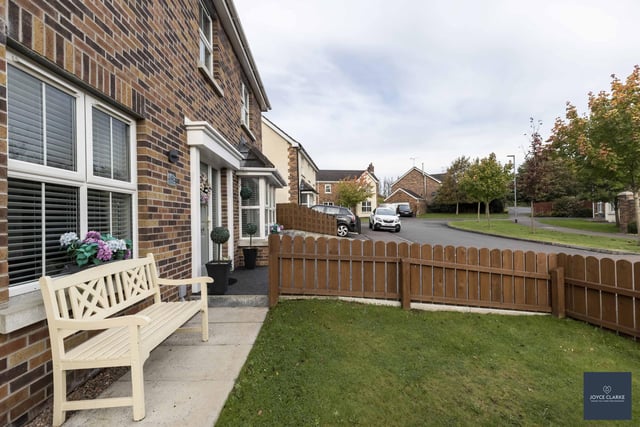 The property has wraparound gardens with a double gated access to front.
