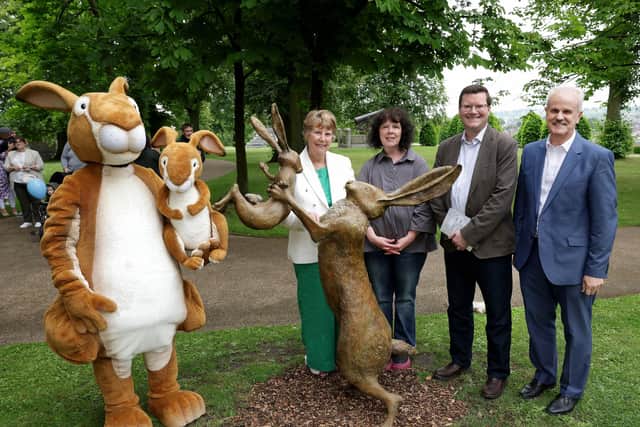 Pictured with the bronze sculpture as part of the new interactive Guess How Much I Love You trail are: (l-r) Big Nutbrown Hare and Little Nutbrown Hare; Maralyn McBratney; Trudy Burke, sculptor; Olive McKeown, Tourism Northern Ireland and Councillor Thomas Beckett, Communities & Wellbeing Chairman. Pic credit: Lisburn & Castlereagh City Council