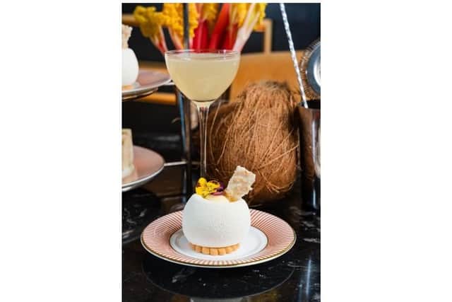 A trio of delightful patisseries are included in The Merchant Hotel's afternoon tea summer cocktail edition, including a coconut and pineapple cremeux inspired by the classic Pina Colada. Picture: released on behalf of The Merchant Hotel.