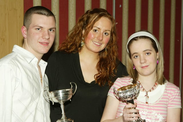 Rosemary Black pictured with Sheagh Mooney and Aine Duncan, arts festival prizewinners at the Glens YFC Dinner in the Marine Hotel in Ballycastle in 2007