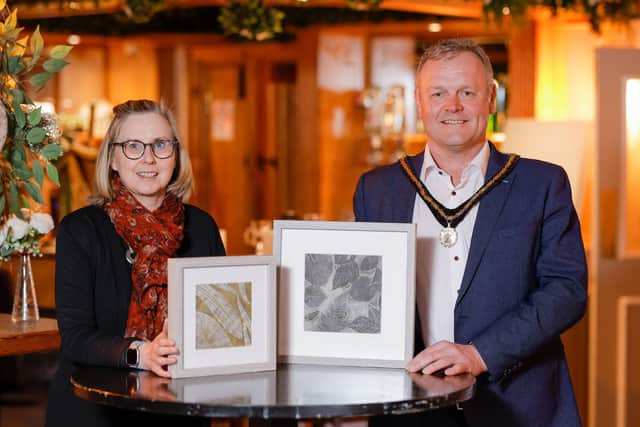 Deputy Lord Mayor Councillor Kyle Savage and Martina McGleenan Printing Artist.