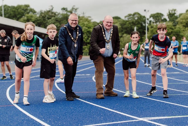 Photographed at the newly resurfaced track are (L-R): Kiyomi Tosh, Jack Parker, Deputy Mayor, Cllr Paul Dunlop, Mayor, Cllr Neil Kelly, Isabella Smyth and Harry Davidson.