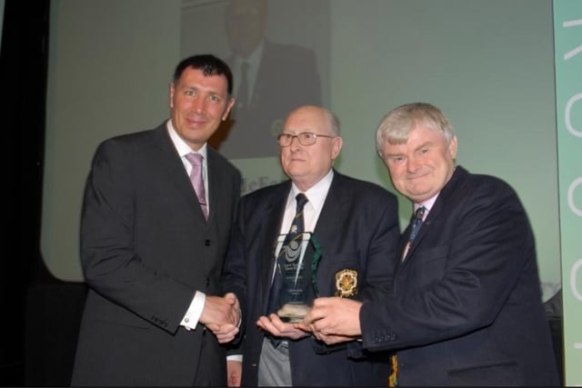 Jim McFaul received the Veterans Award from Lawrie Sanchez and John Shannon from award sponsor Inver Garden Centre during the Larne Borough Council Sports Awards 2007 in the McNeill Theatre.