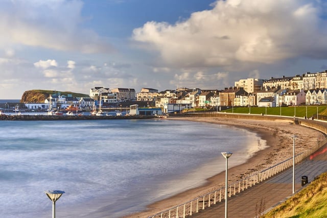 Located in Portrush, Co. Antrim, both East and West Strand are great beaches to walk your dog with both of them being a Blue Flag Beach. 
Both beaches are huge with lots of room for your dog to run, dig and swim. 
The Portrush Parkrun is on every Saturday morning and you can bring your furry friend with you to run. 
Both beaches are exceptionally clean with a lifeguard on duty every day from 21 June to 7 September 7.
For more information, go to causewaycoast.holiday/portrush-east-strand
