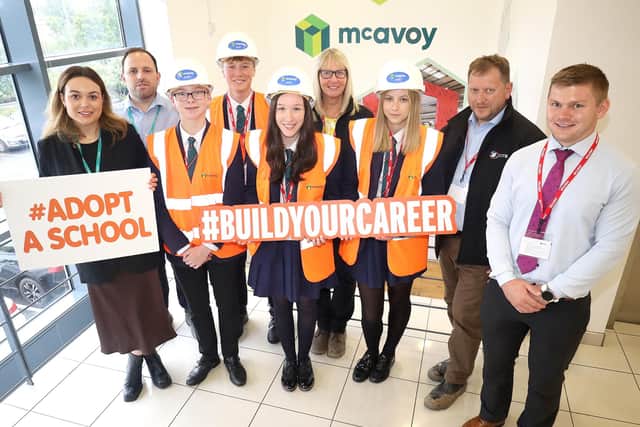 (L-R) Darcy Webb & Sean Keltai from McAvoy, pupils from Wellington College, Amanda Stevenson & Barry Neilson  (OBE) from CITB NI and Mark Keane, Wellington College. Pic credit: Peter O'Hara Photography