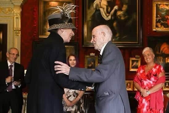 The late Norman Irwin receiving his BEM from the Princess Royal at Hillsborough Castle in 2025.