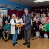 The Mayor, Alderman Noel Williams, with participants on the sustainable food education programme at Greenisland.