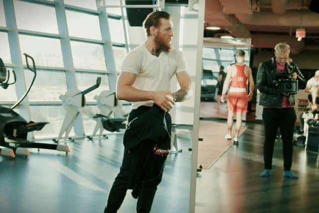 Northern Ireland's Carl Quinn, 30, on set working with Conor McGregor