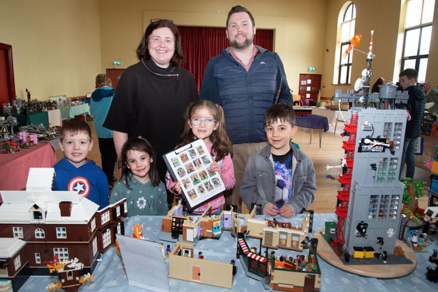 Pictured at the Lego exhibition in Thomas Street Methodist Church Hall on Saturday are, Norma Thompson and her son Darren with front from left, Arthur Anderson (4), Thea Thompson (4), Amelia Anderson (6) and Harvey Thompson (6). PT15-200.