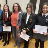 Prizewinners: Emma Doherty, Amy McAuley (joint third), Heidi White, Elizabeth Lennox (joint second), overall winner Emily Sayers from Dalriada with Ballymoney Soroptimist President Sharon McCaffrey. Credit Jennifer Campbell