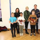 Pictured from left: Clare McCrystal, Anne Marie Convery, Gino Lupari and Malachi Cush with pupils Gabija, Jervika, Nikodem and Roholla. Credit: Submitted