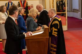 Principal and Portrush man Dr Paul Little CBE chats to Queen Camilla as he receives the Queen's Anniversary Prize for Higher and Further Education on behalf of City of Glasgow College. Credit British Ceremonial Arts Ltd