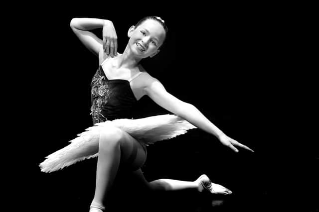 Brooke McConkey finishes off her dance with a flourish in the Ballet Solo 9-10 Years section of Portadown Dance Festival. PT17-203.