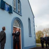 The US Consul General, James Applegate unveils the blue plaque in honor of William Tennent at Vinecash Presbyterian Church along with the Presbyterian Moderator,  Right Rev Dr Richard Murray. PT45-201.